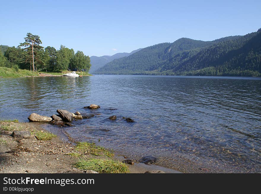 Water view, blue sky and mountains. Water view, blue sky and mountains