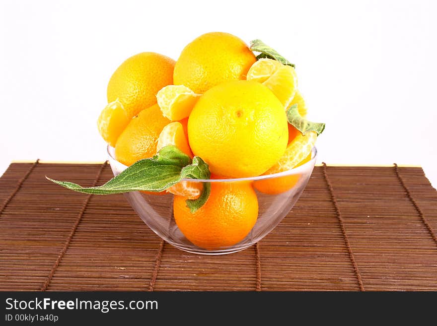 Fresh tangerine and orange isolated on white background