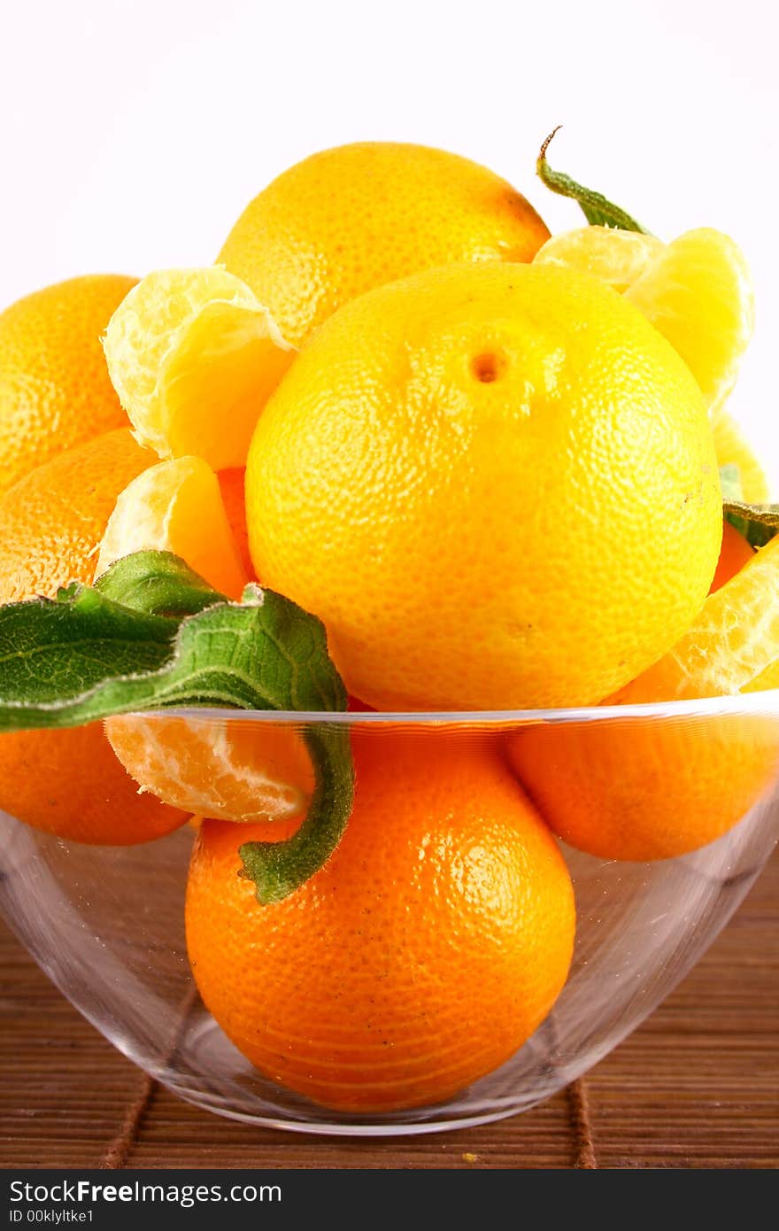 Fresh tangerine and orange isolated on white background