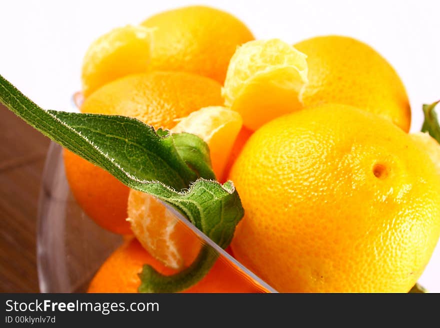 Fresh tangerine and orange isolated on white background