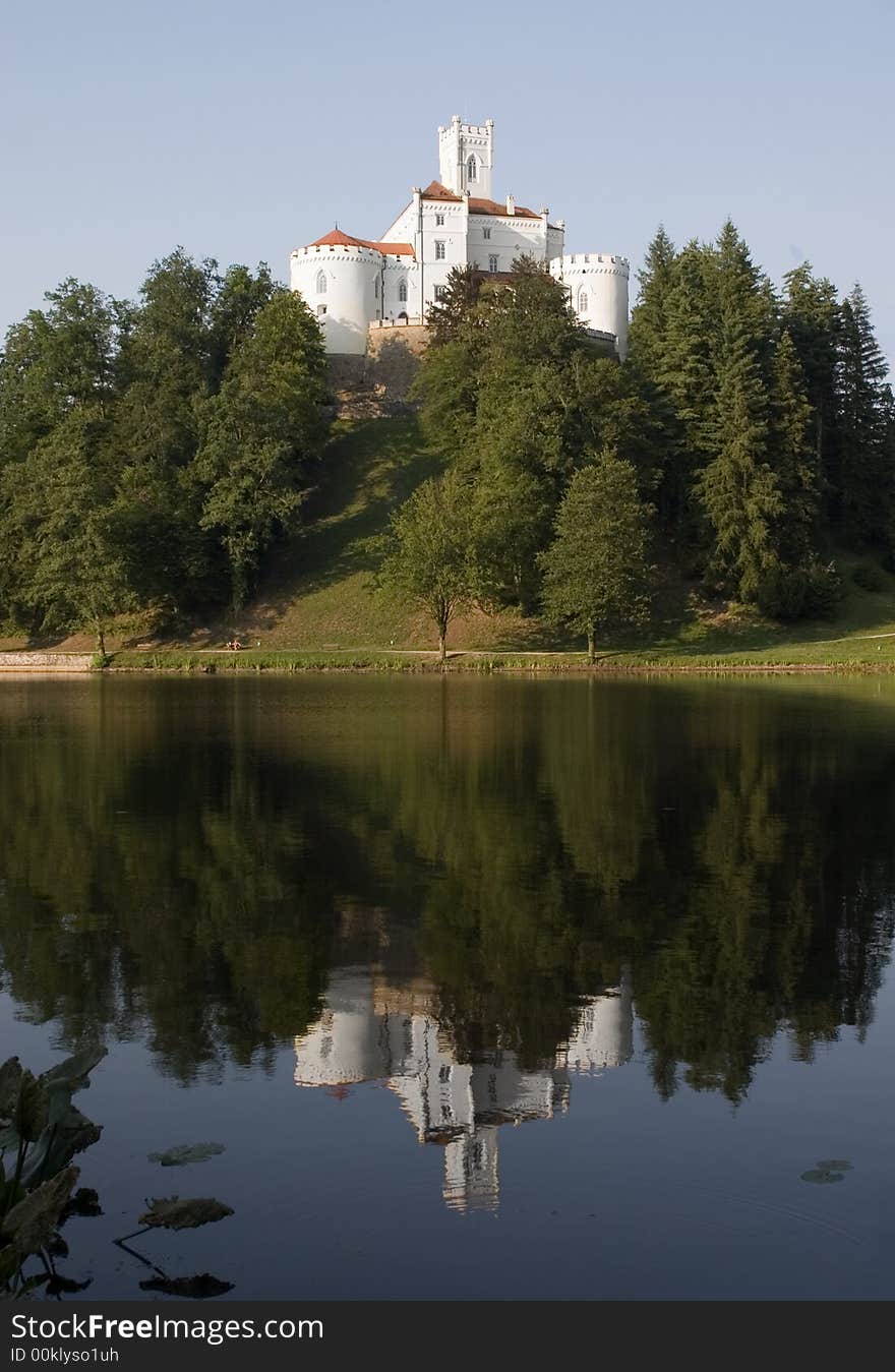 Trakoscan castle on lake with reflection