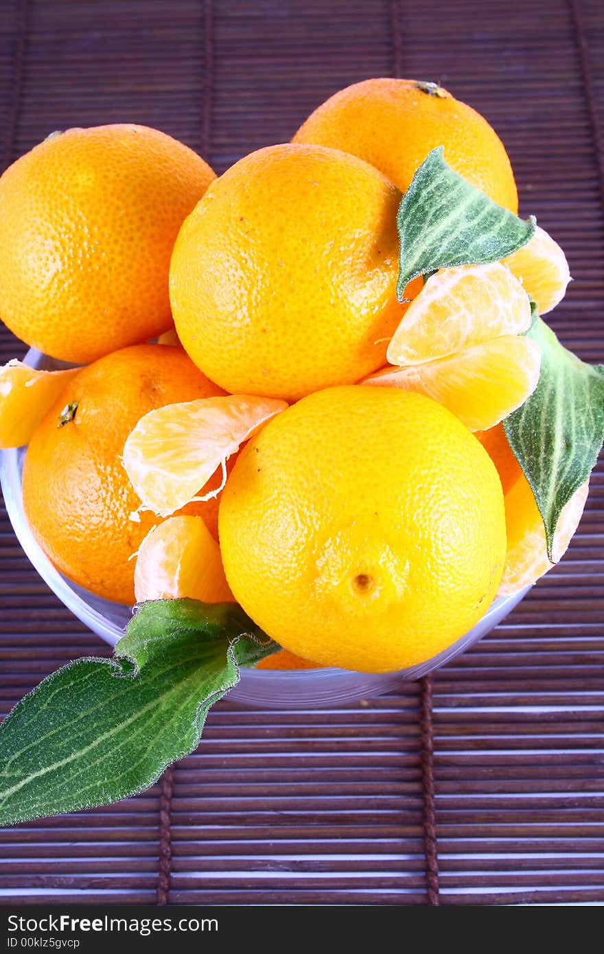 Fresh tangerine and orange isolated on white background