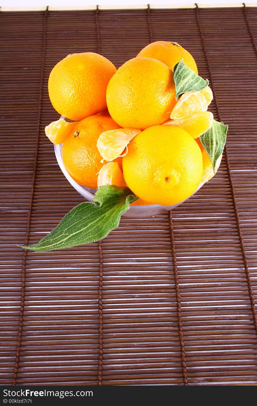 Fresh tangerine and orange isolated on white background