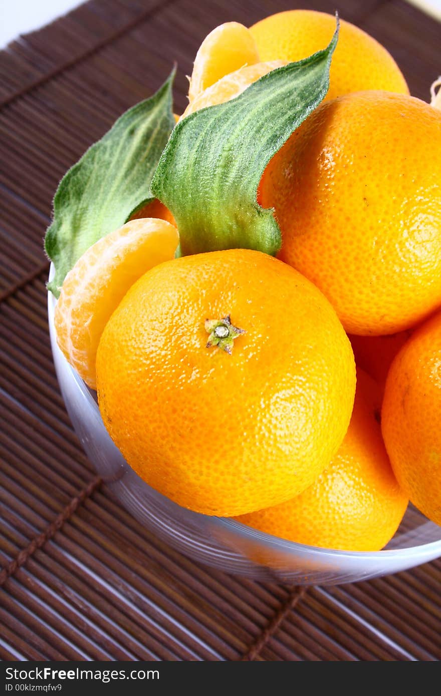 Fresh tangerine and orange isolated on white background