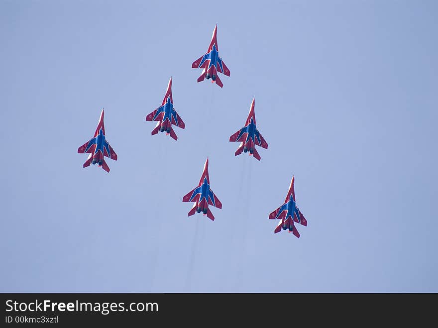 Six planes on a background of the blue sky. Six planes on a background of the blue sky