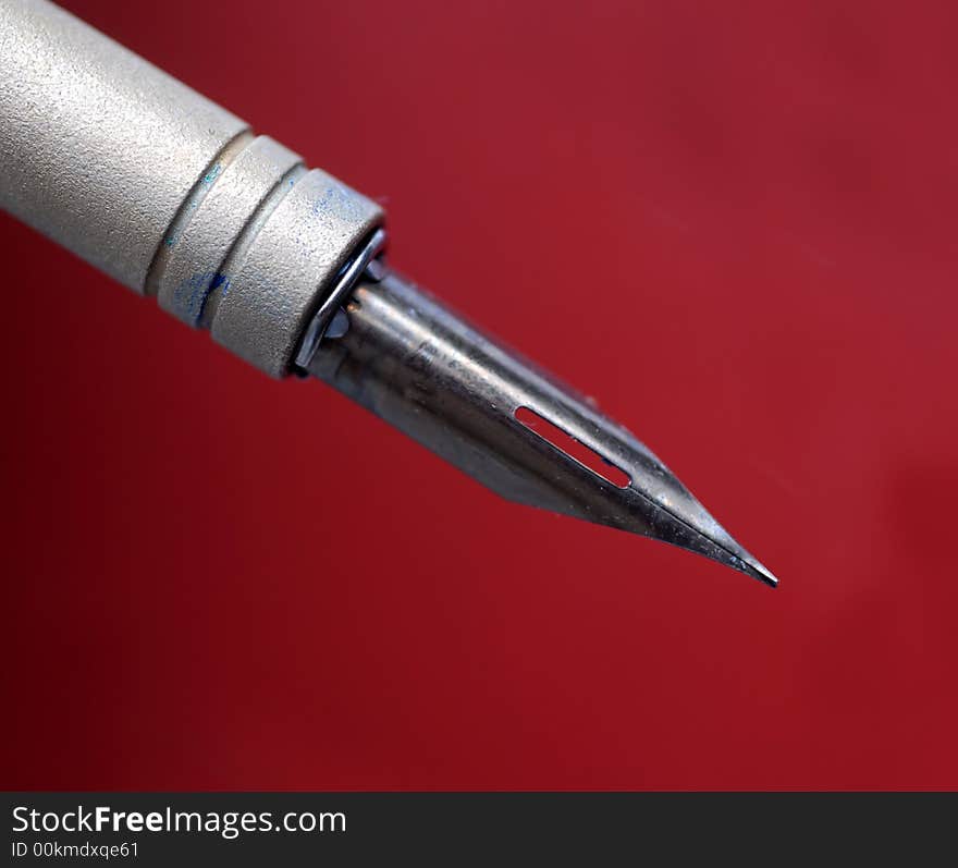 Fountain Writing Pen set against red background