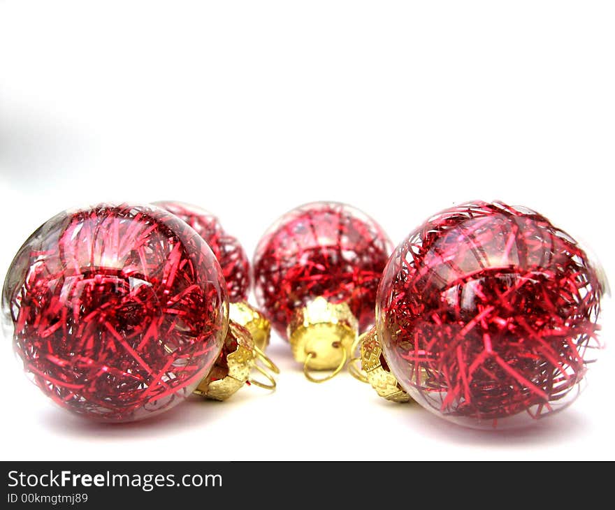 Red christmas balls on white background