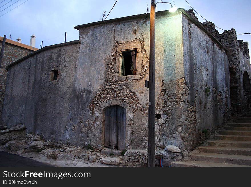 Ruined houses in the village of Milopotamos in the island of Kythera, Greece. Ruined houses in the village of Milopotamos in the island of Kythera, Greece