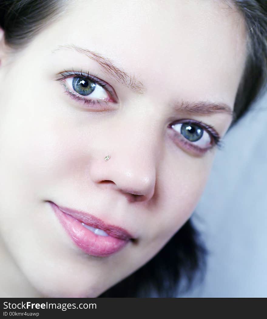 Young woman portrait,close-up, macro, focus on the left, looking trustful. Young woman portrait,close-up, macro, focus on the left, looking trustful