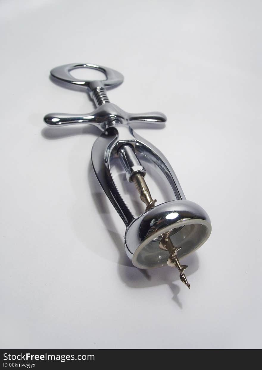 Kitchen attributes: a chromeplated metal corkscrew