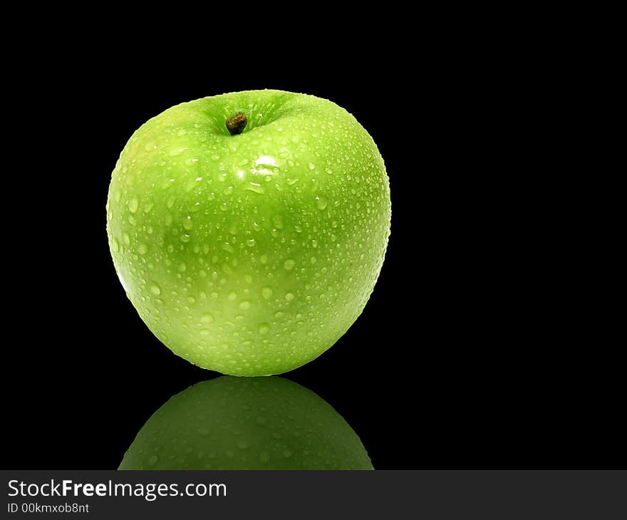 Wet apple with a reflection. Wet apple with a reflection