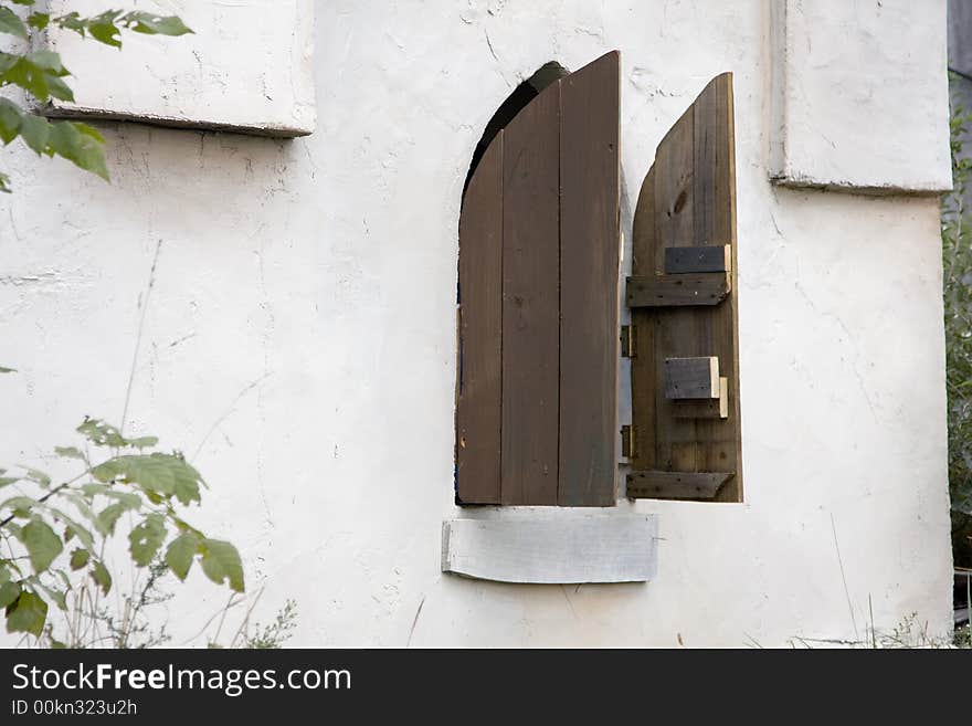 Wooden shutters open to the outside. Wooden shutters open to the outside