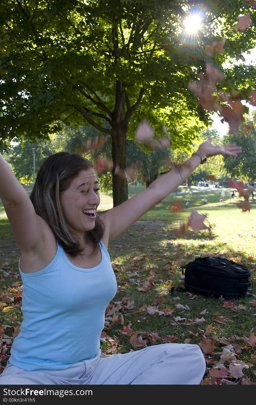 Woman Playing With Leaves