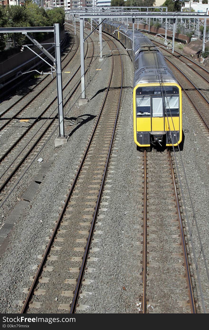 Straight Railway Tracks With Approaching Train, Public Transportation