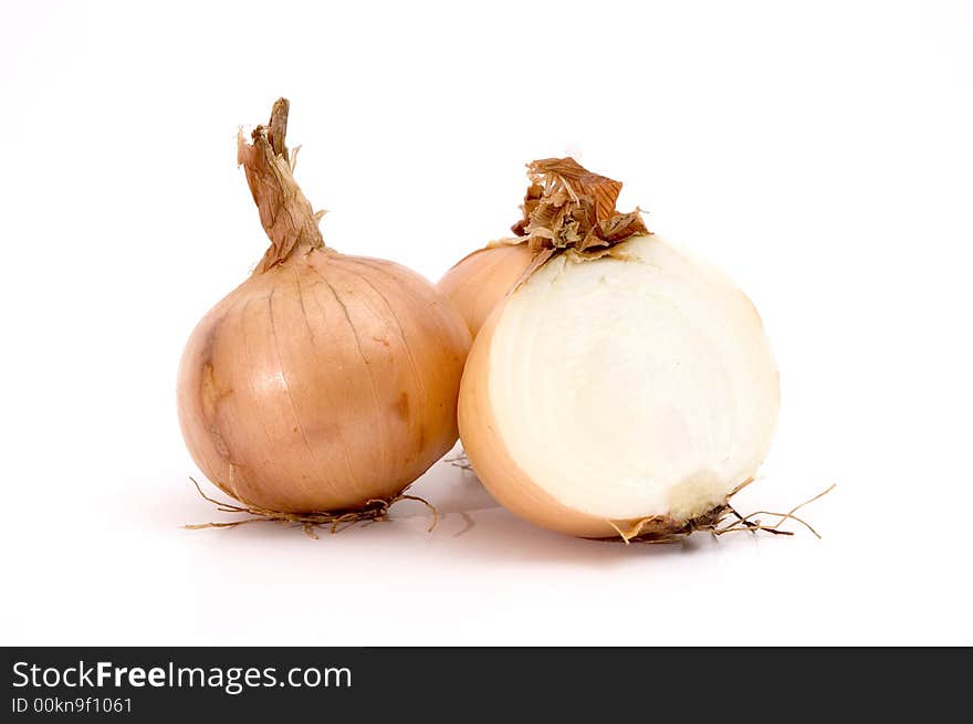 Group of white onions isolated over white