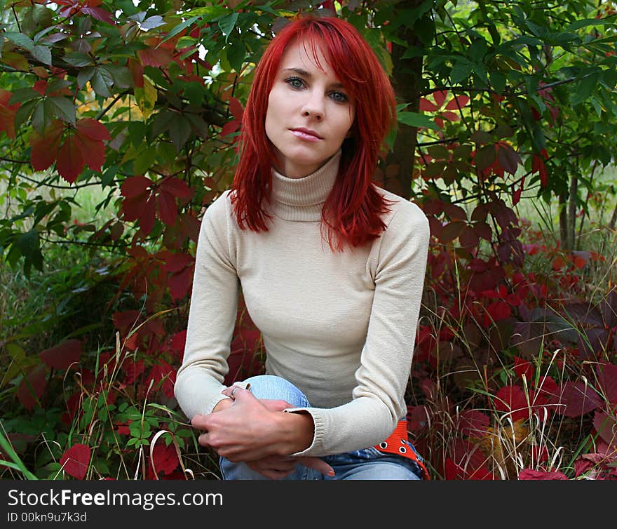 Beautiful sad girl with red hair. Beautiful sad girl with red hair