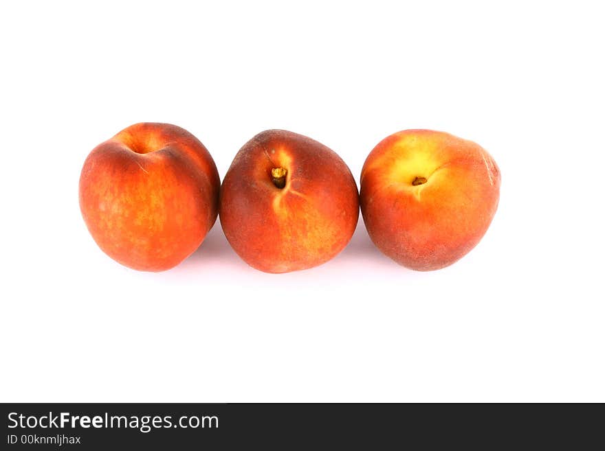 Ripe Peach with Leaf on White Background