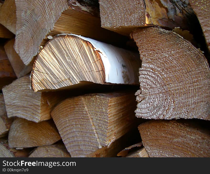 Stack of firewood, pine and birch.