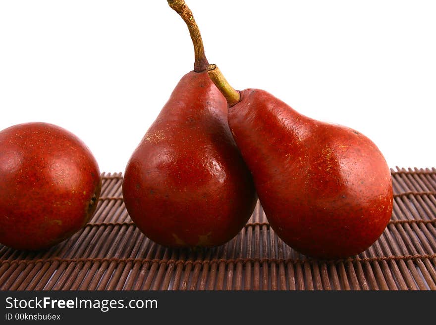 Pear and half of pear on white background