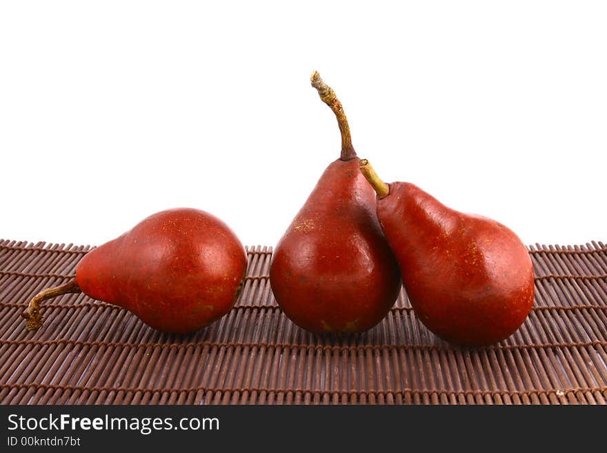 Pear and half of pear on white background