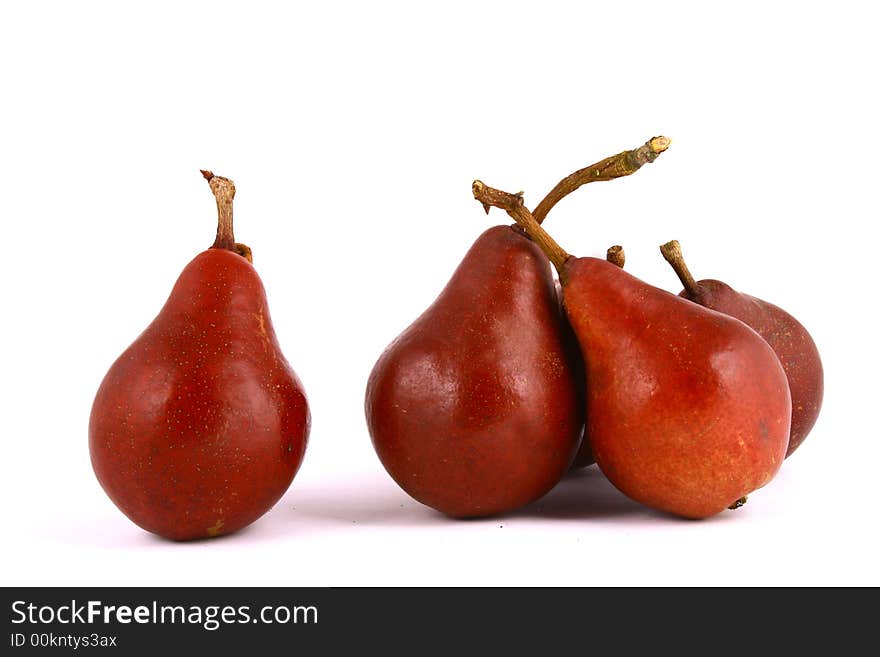 Pear and half of pear on white background