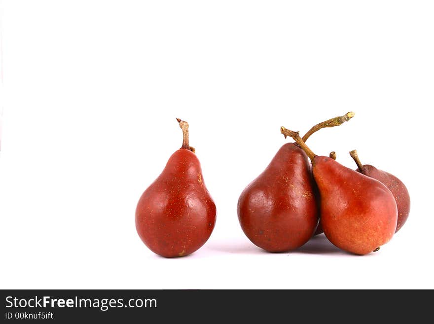 Pear and half of pear on white background