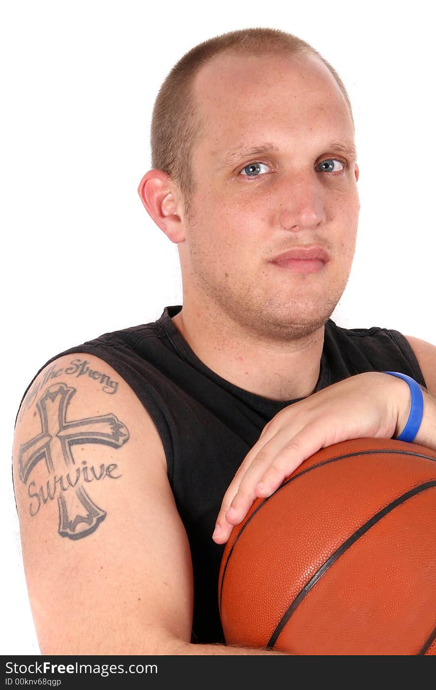 A young man with bright blue eyes and a basketball! Isolated over white!. A young man with bright blue eyes and a basketball! Isolated over white!