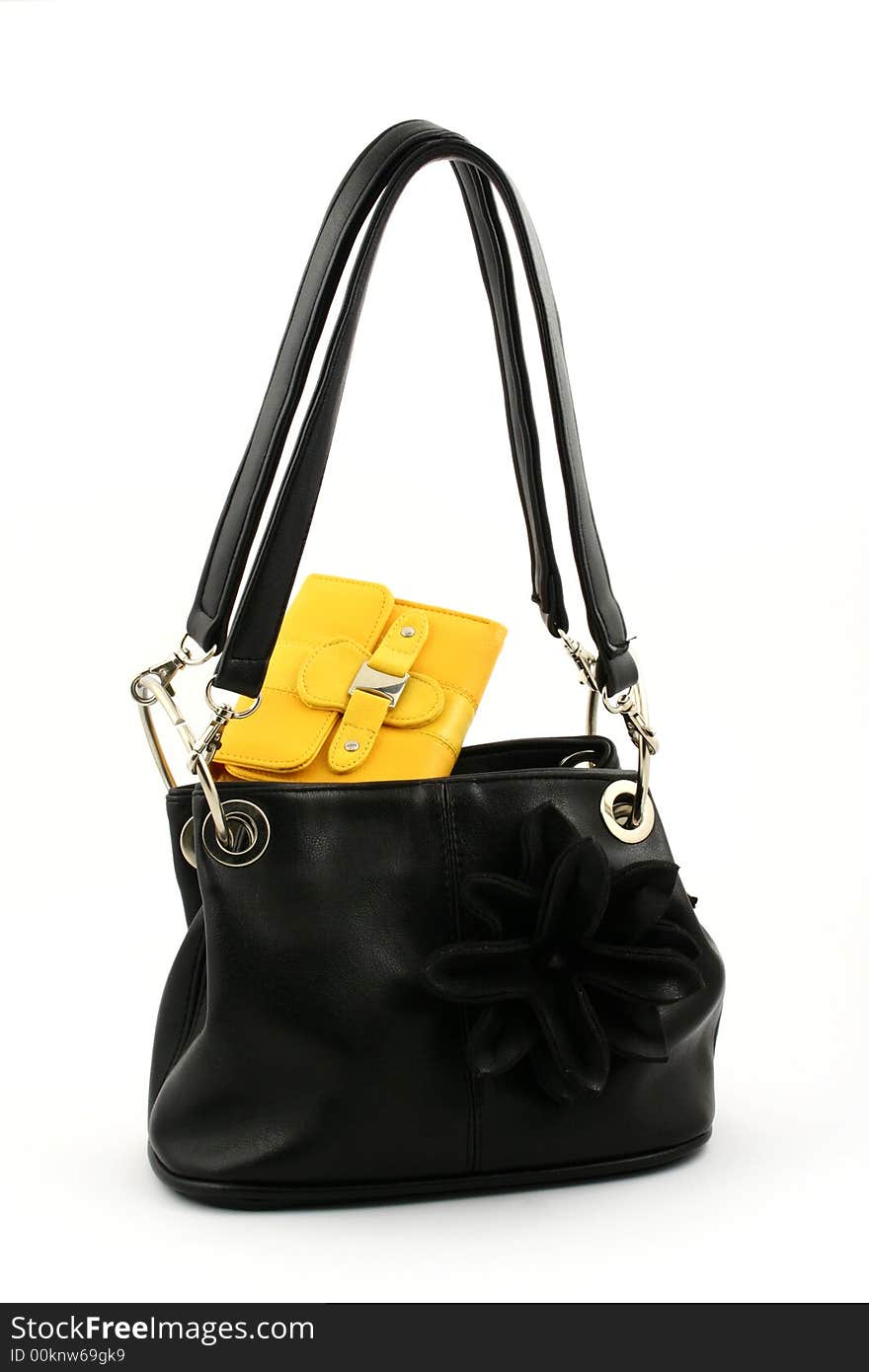 Black bag and yellow wallet