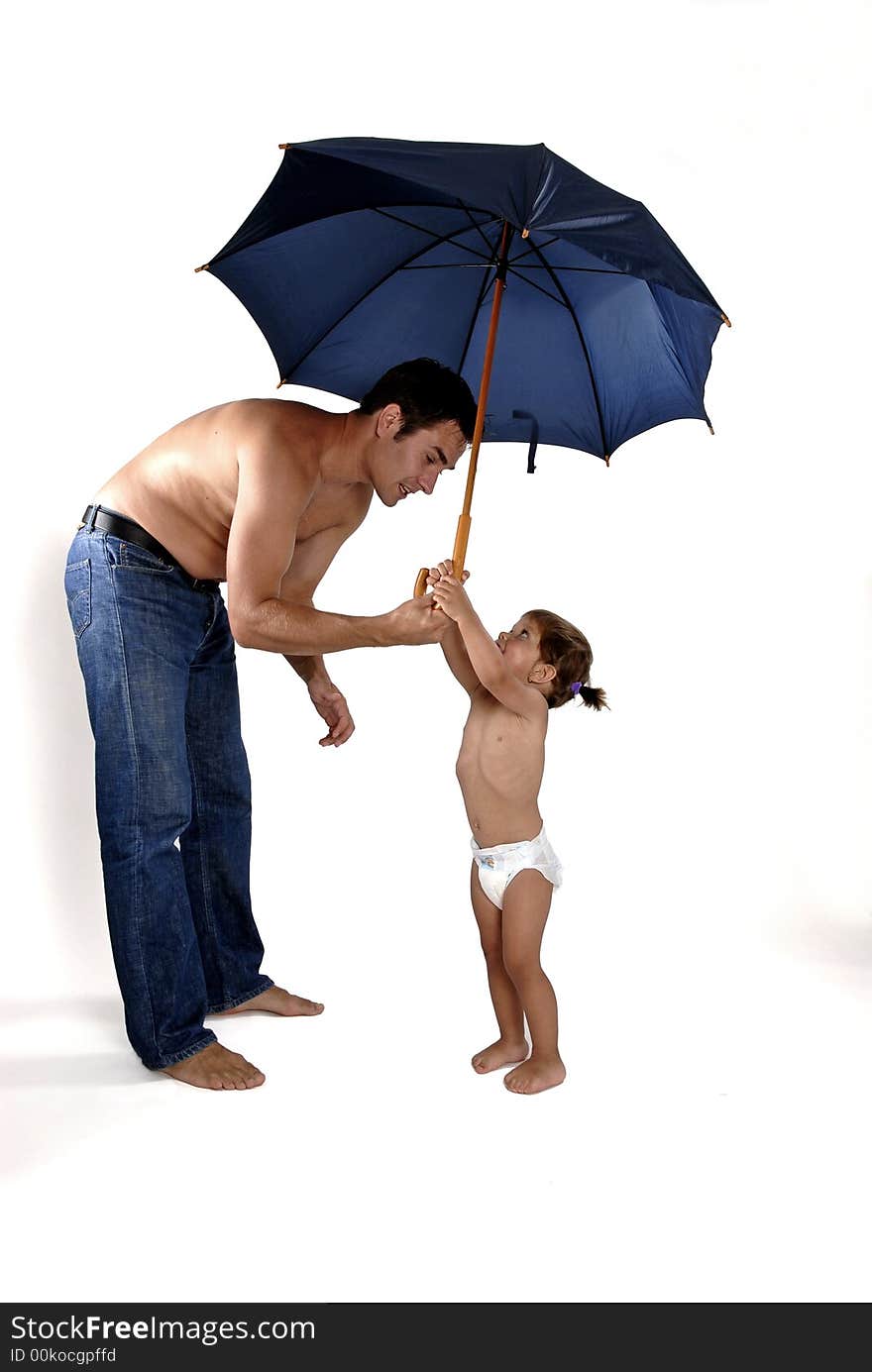 Picture of happy family - father with daughter under umbrella