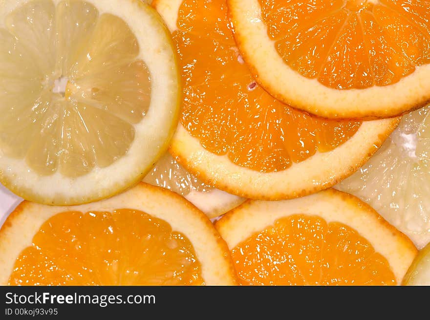 Slices of lemon an orange. Slices of lemon an orange