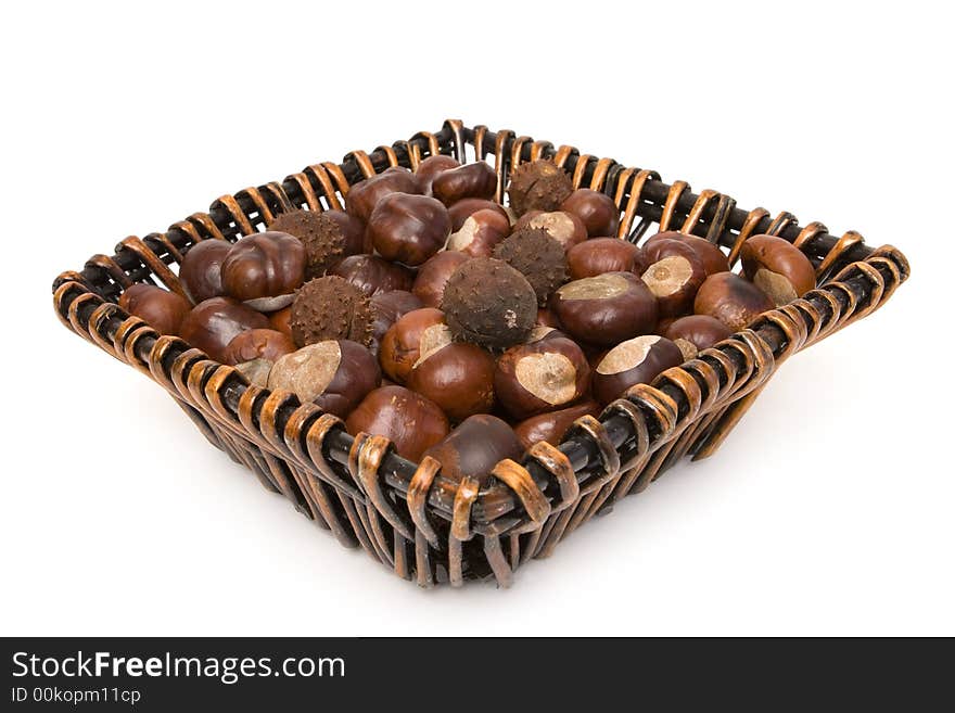 Chestnuts in a gasket isolated on a white background