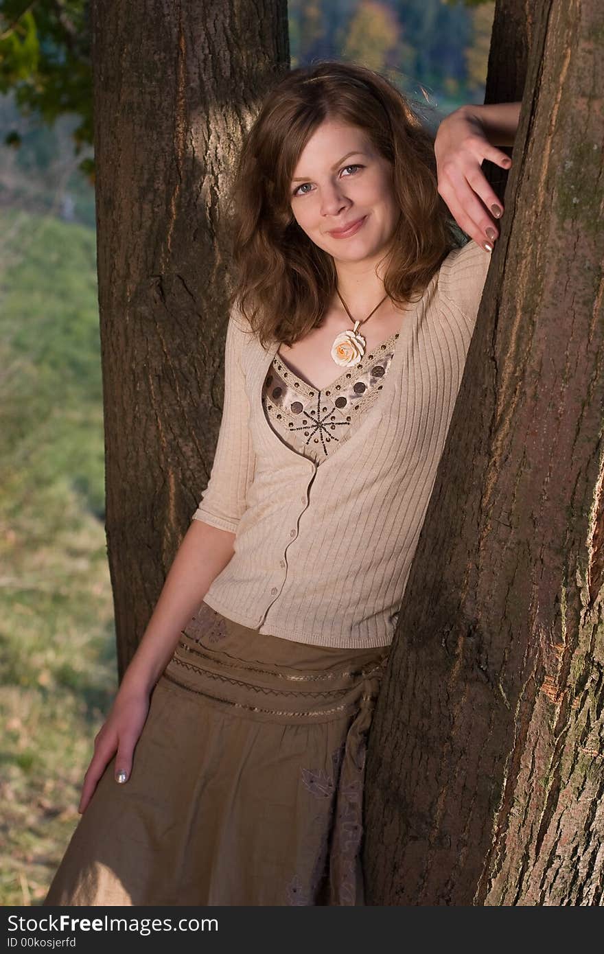 Smiling Girl Near Tree