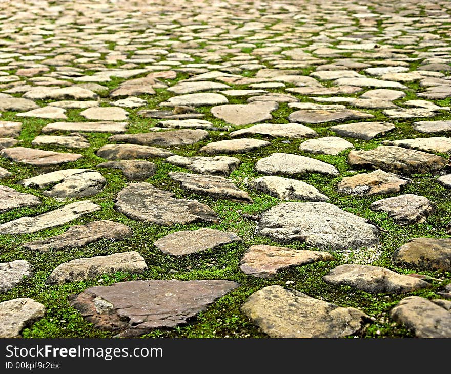 Landscape photo of random stone paved surface with shallow focus. Landscape photo of random stone paved surface with shallow focus.