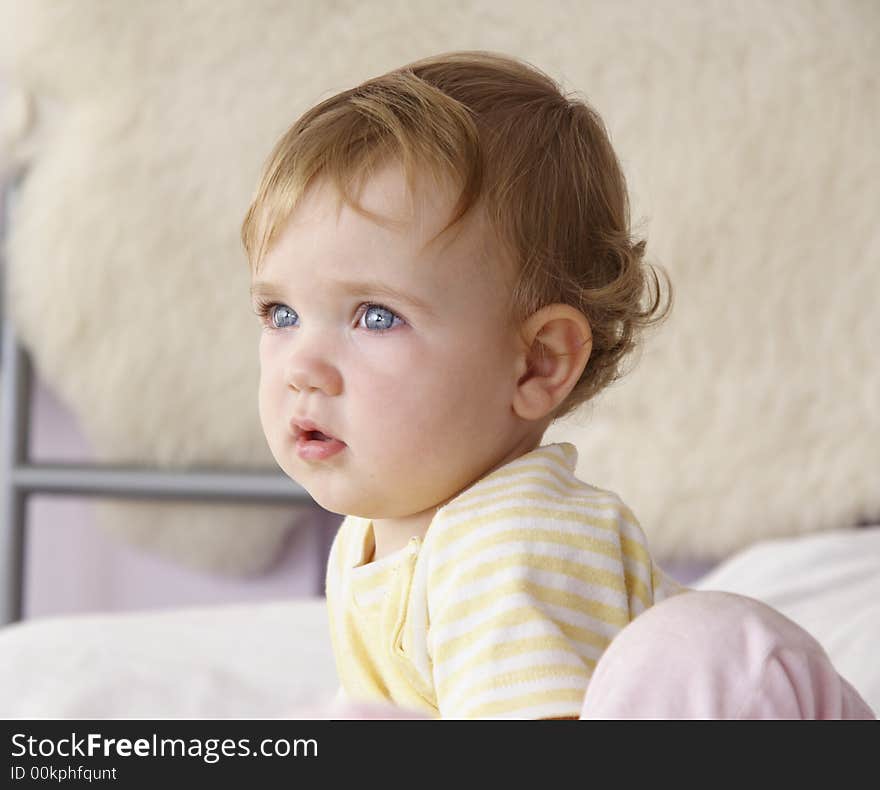 A baby, who looks a bit confused. A baby, who looks a bit confused.