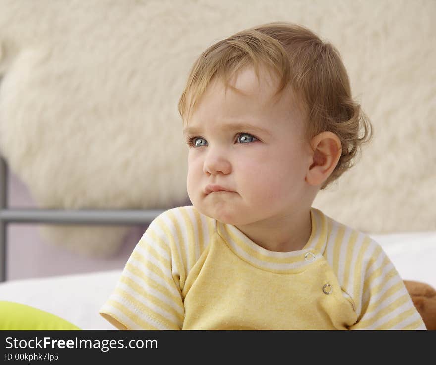 A white baby, who looks really dark. A white baby, who looks really dark.