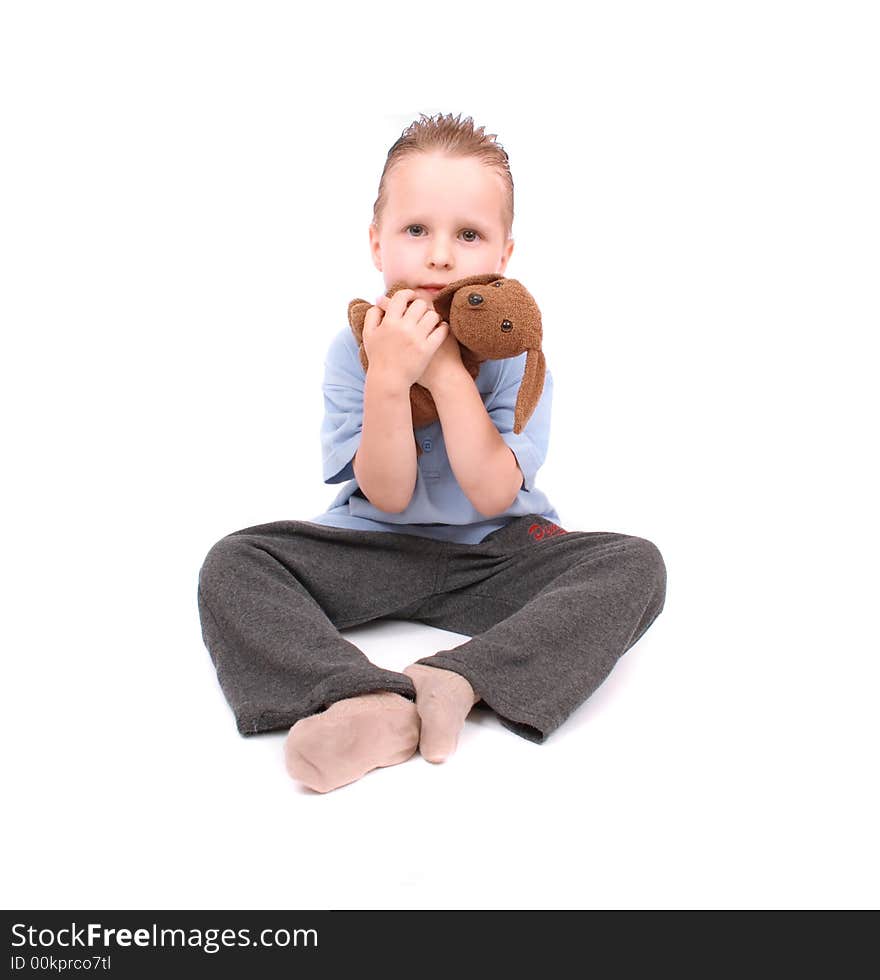 Boy and his toy (dog) on the white background