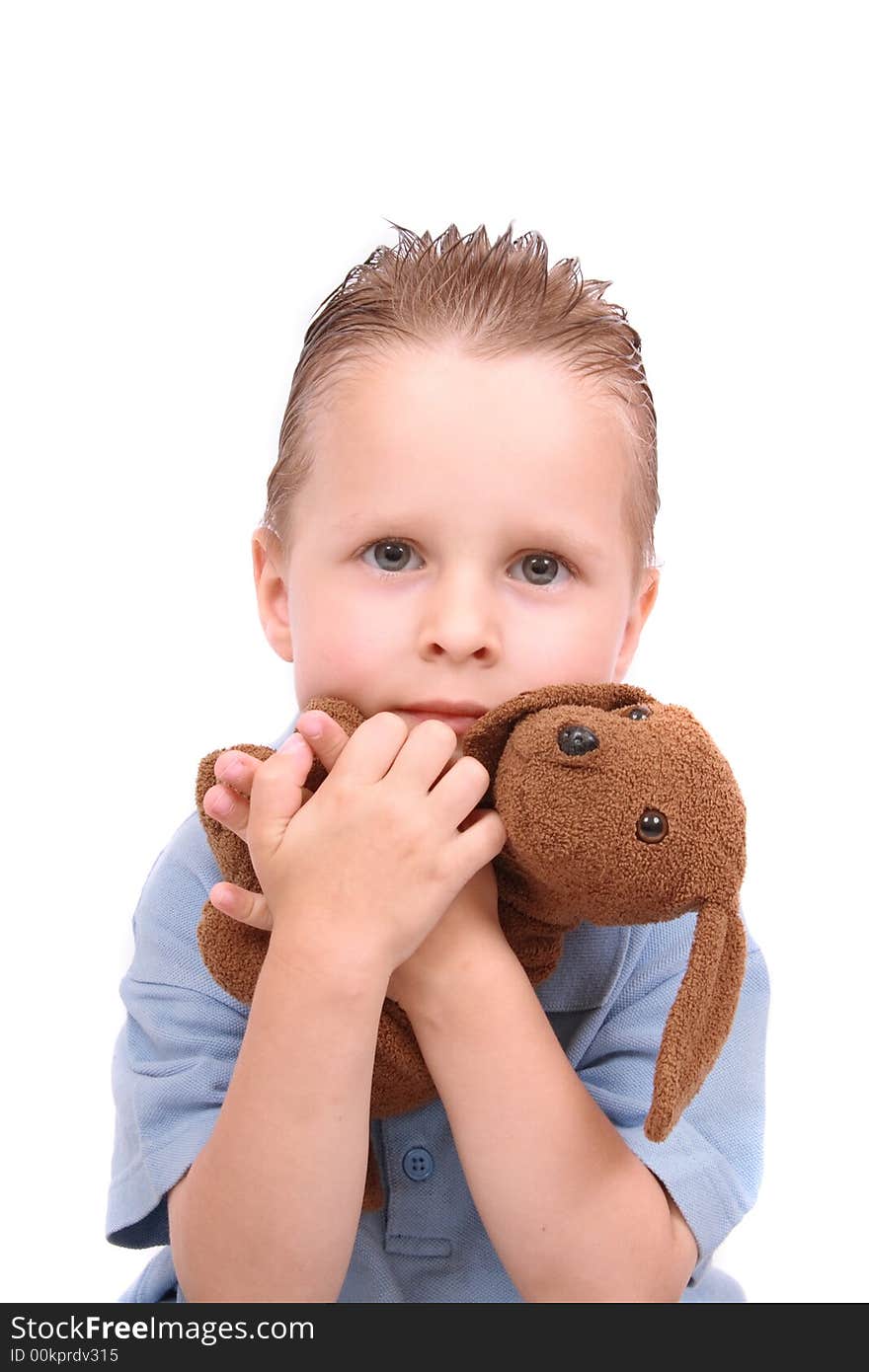 Boy and his toy (dog) on the white background