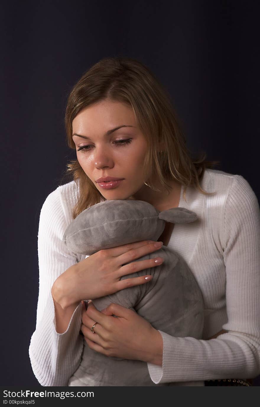 Beautiful Young Woman With Toy