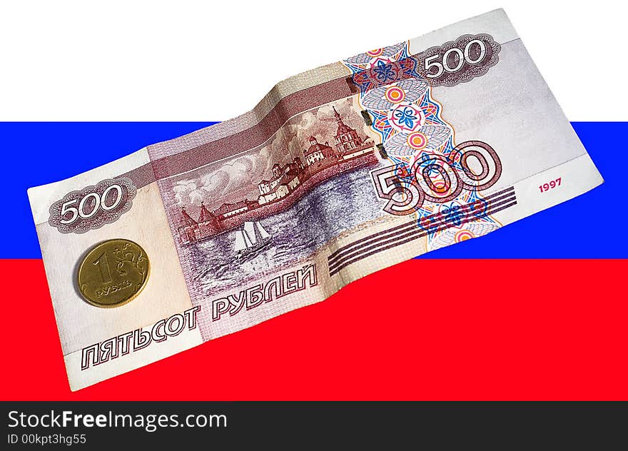 The Russian currency, metal and paper on a background of a national flag. The Russian currency, metal and paper on a background of a national flag.