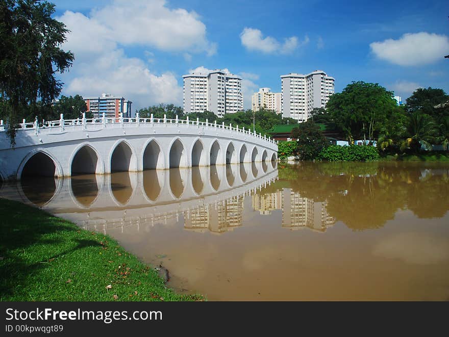 Modern town in the background of a tranquil scene. Modern town in the background of a tranquil scene