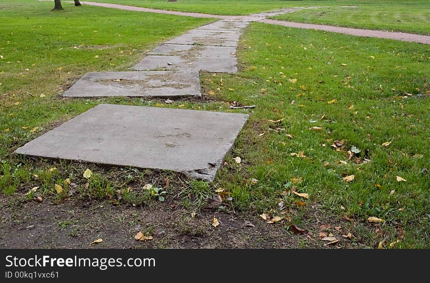 Track. Tile from concrete in autumn. Track. Tile from concrete in autumn.