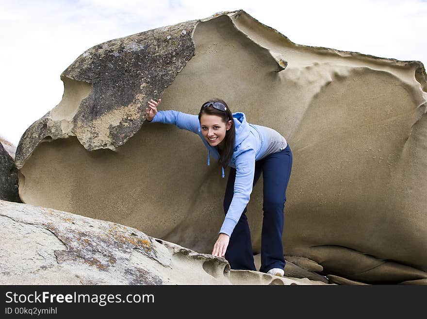 Young Woman Climbing Sandstone