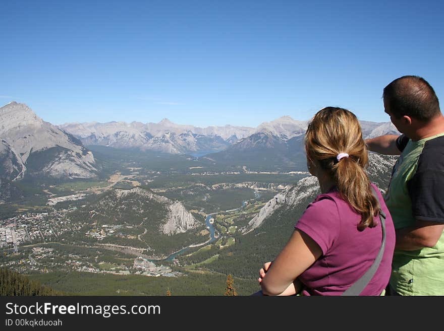 Couple overlooking rockies mou