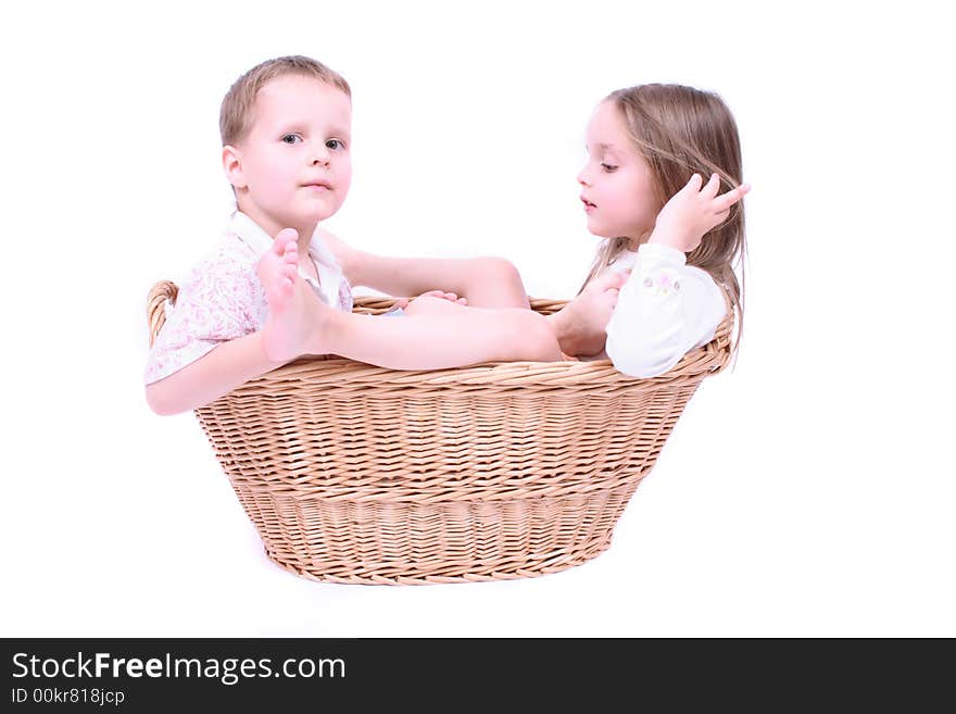 Twins in the basket on the white background