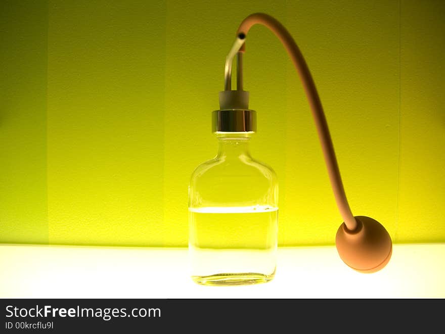 Small bottles with colored liquid in a colored laboratory. Small bottles with colored liquid in a colored laboratory.