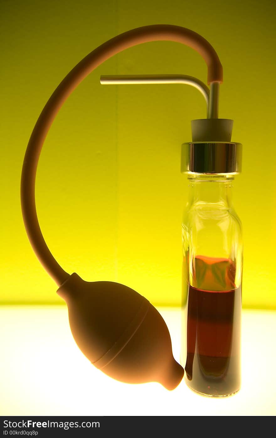 Small bottles with colored liquid in a colored laboratory. Small bottles with colored liquid in a colored laboratory.