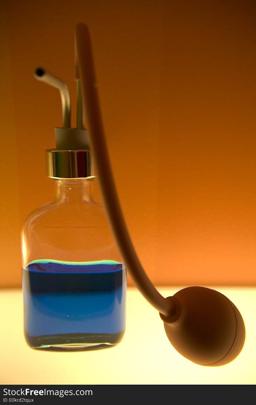 Small bottles with colored liquid in a colored laboratory. Small bottles with colored liquid in a colored laboratory.