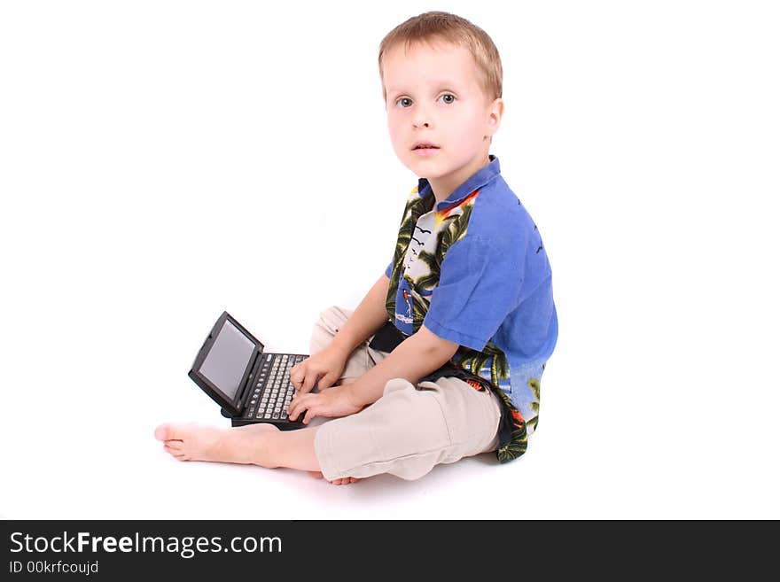 Young manager (boy) and his portable computer on the white background. Young manager (boy) and his portable computer on the white background