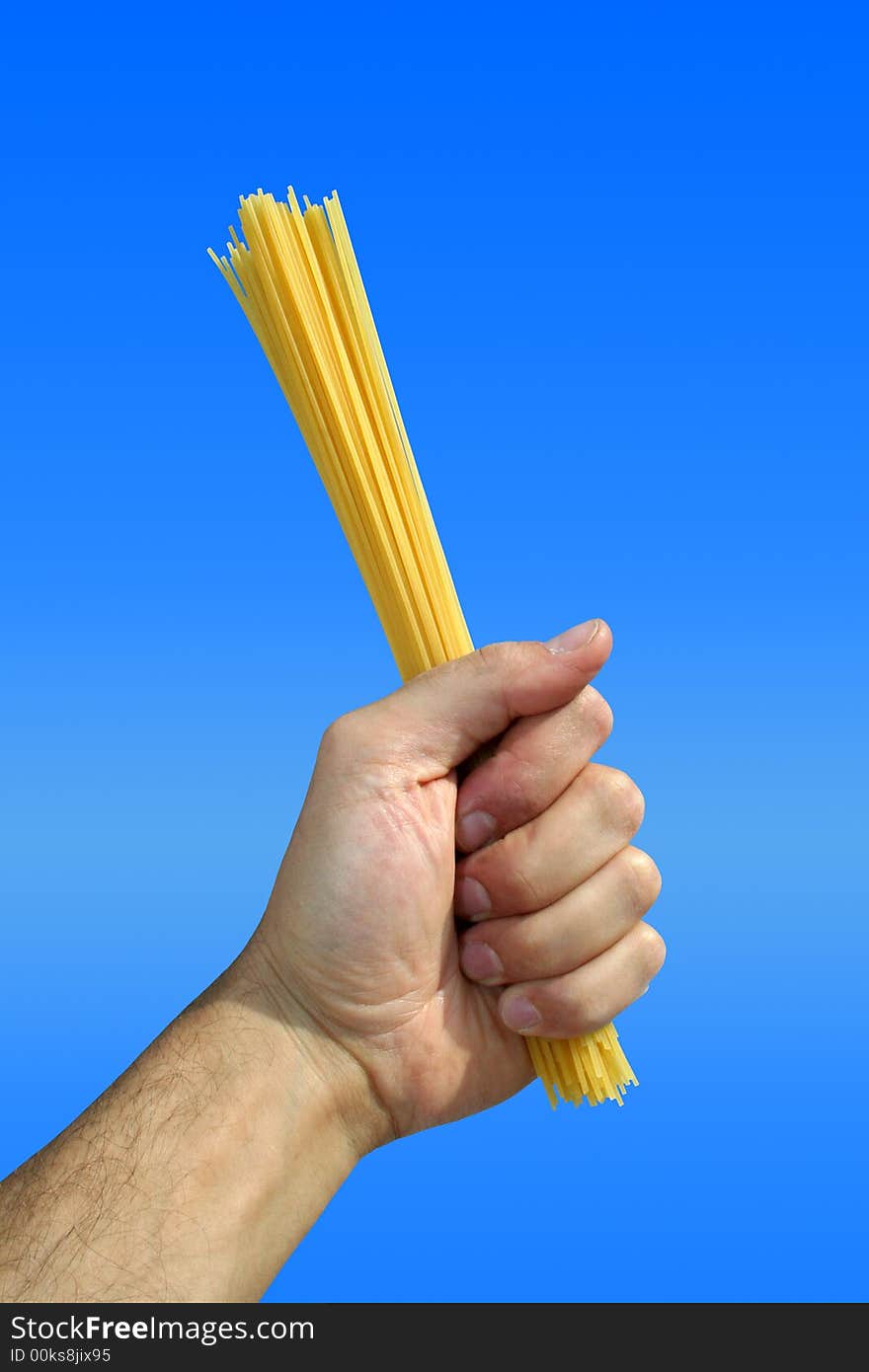 The Pasta Italiana in Hand / Isolated / Clear Sky Background. The Pasta Italiana in Hand / Isolated / Clear Sky Background