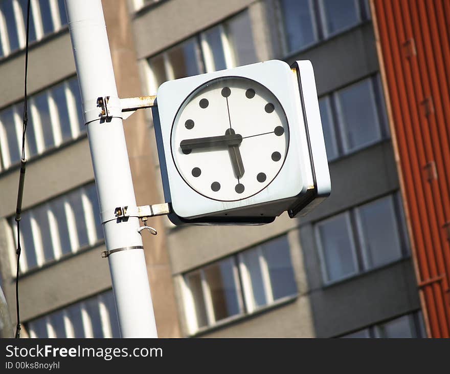 Vivid and colourful view of a city clock time is five fourty five